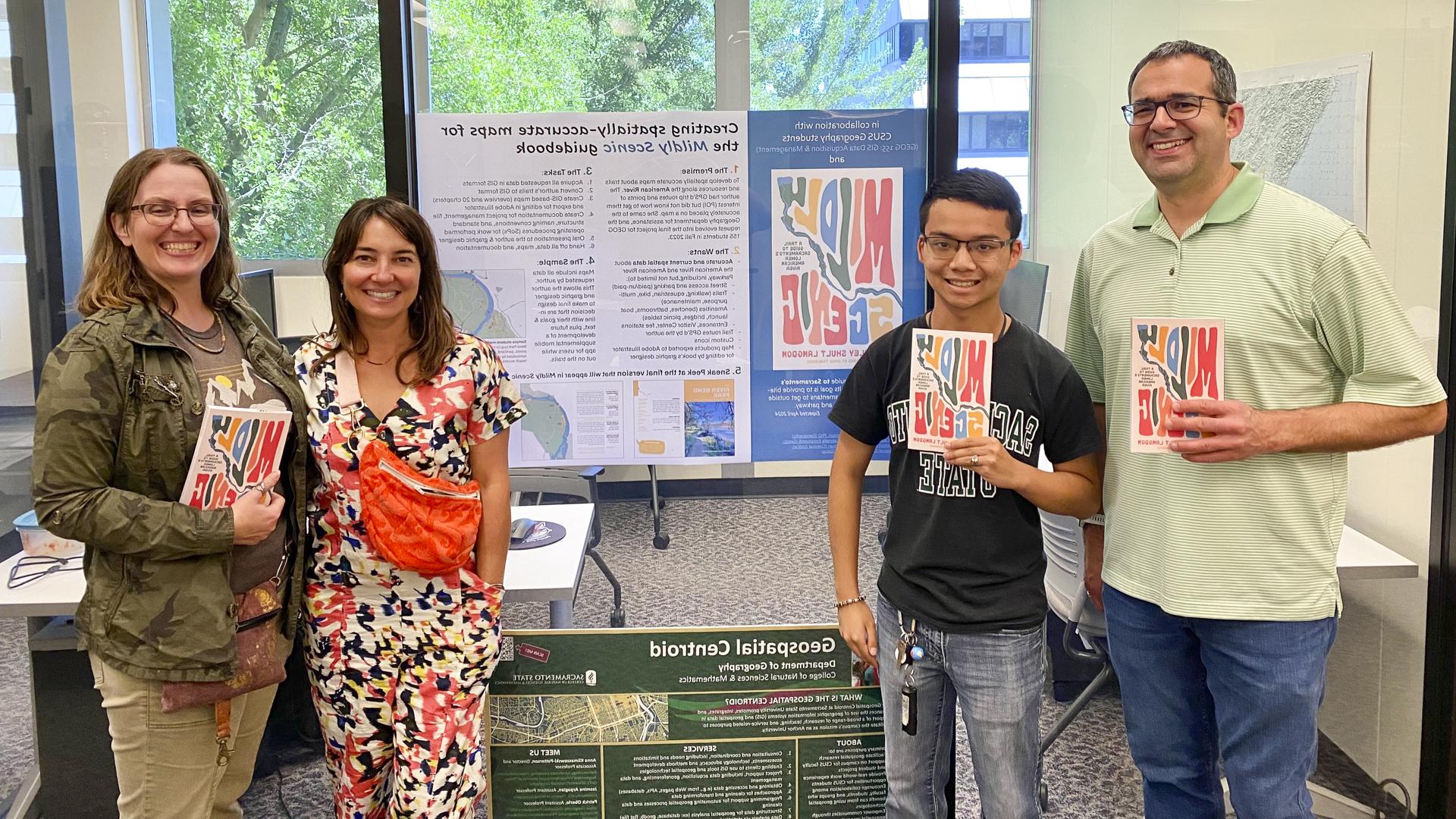 Matt Schmidtlein, Andrew Herron, Ashley Langdon and Anna Klimaszewski-Patterson stand in front of a poster board.